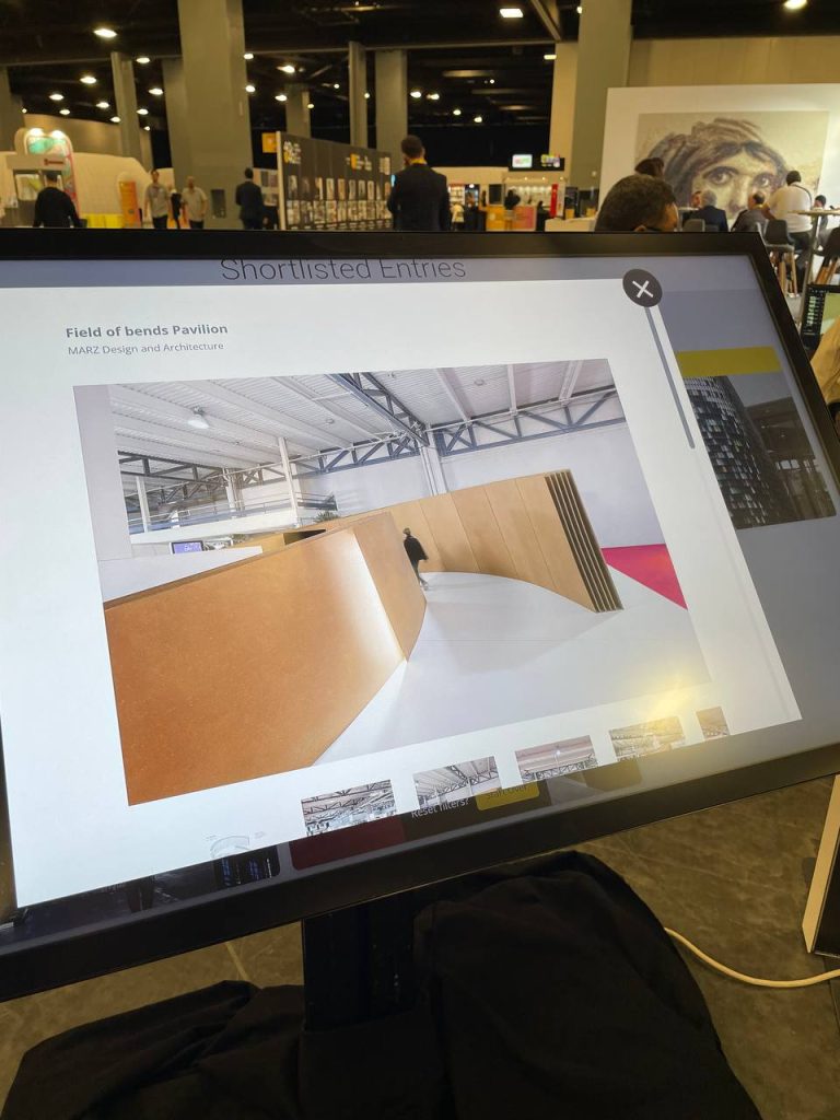 MARZ presenting their shortlisted projects at WAF 2025 in Miami, including DigiKala Flagship Store, Quartet of Learning, and Field of Bends Pavilion
